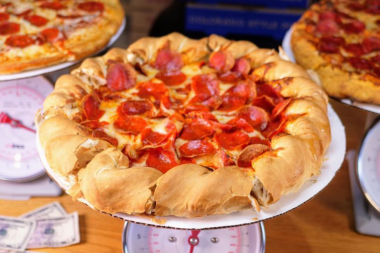 A pepperoni pizza with a mountainous crust from Beau Jo's.