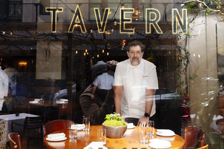 Gramercy Tavern executive chef Michael Anthony standing in the front window