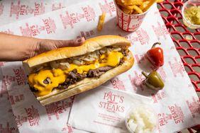 Cheesesteak, fries and peppers from Pat's King of Steaks.