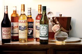 Bottles of liquor on a bar cart.