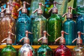 Colorful antique soda bottles in a market in Buenos Aires