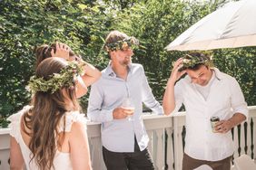 A group of people with flower crowns celebrating Midsummer in Sweden.