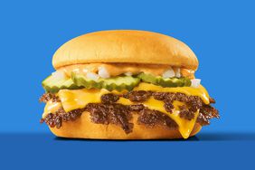 The SONIC Smasher. Hand-smashed to order, features two Angus patties seasoned and seared for a crispy edge and juicy center, layered with two slices of melty American cheese, SONIC's signature Smasher sauce, crinkle-cut pickles and diced onions on a soft potato bun.