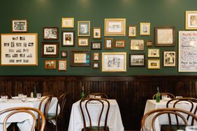 Frames on the wall above seating at Solevo Kitchen and Social